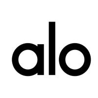 The Alo Yoga Complete Guide title over a blurred background of a yoga studio